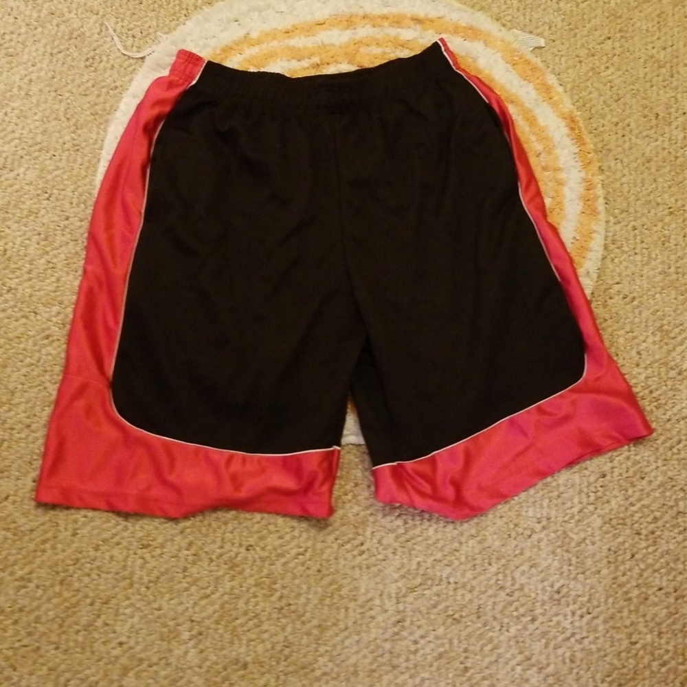 Mens red and black shorts with drawstring inside..